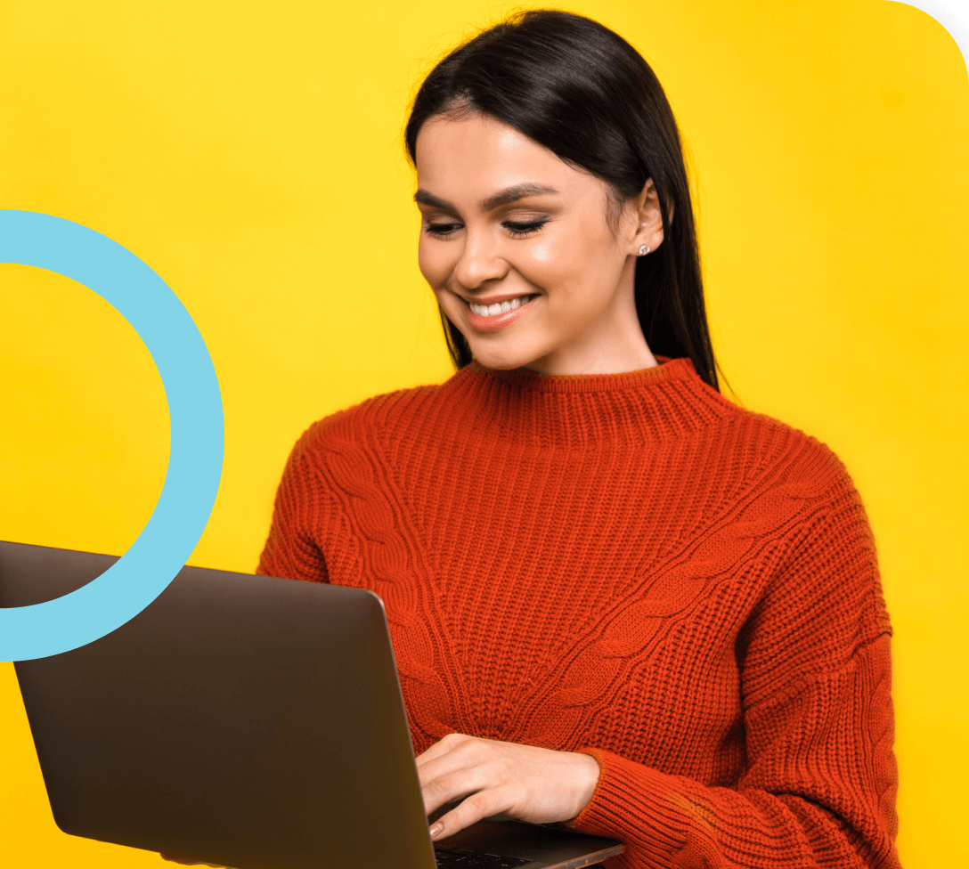 Woman smiling on laptop